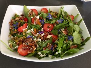 salad, strawberries, edible flowers