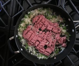 cooking the onions and turkey meat for chilli
