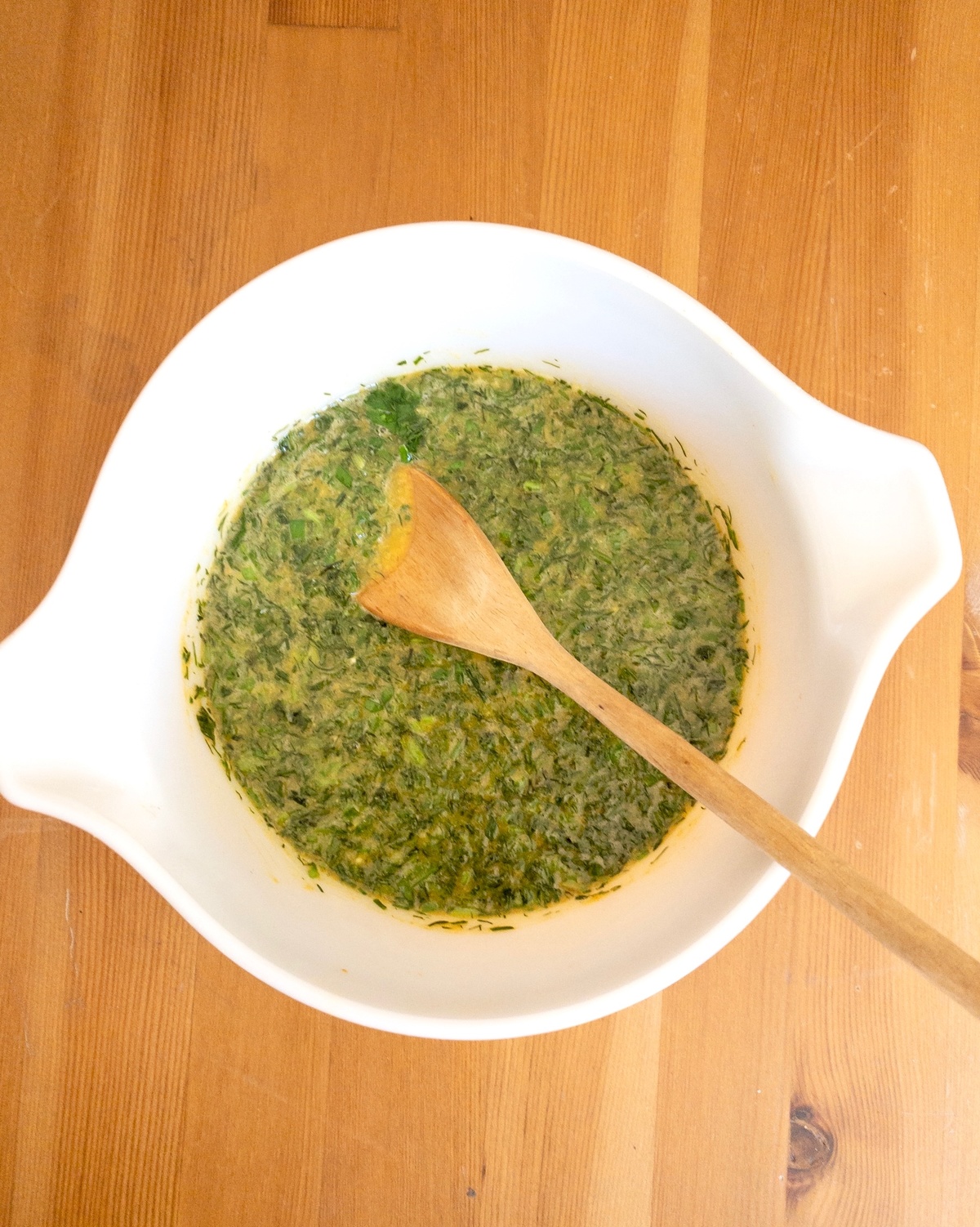 Ingredients for making kookoo sabzi mixed in a bowl