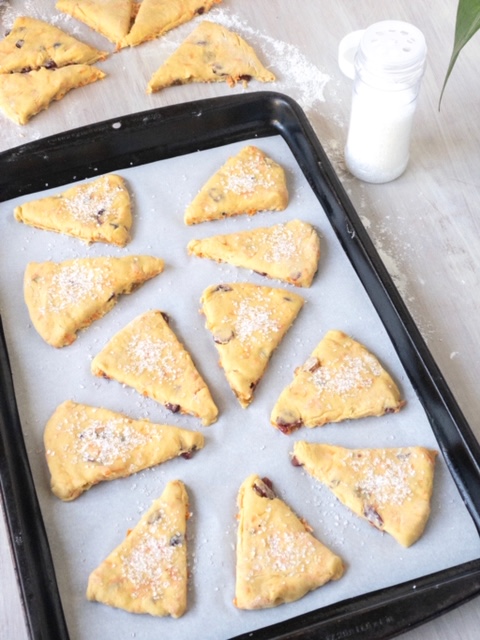 placement of carrot tahini scones on a baking sheet lined with parchment paper placement of carrot tahini scones on a baking sheet lined with parchment paper
