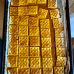 brittle sauce sohan over Saltine crackers